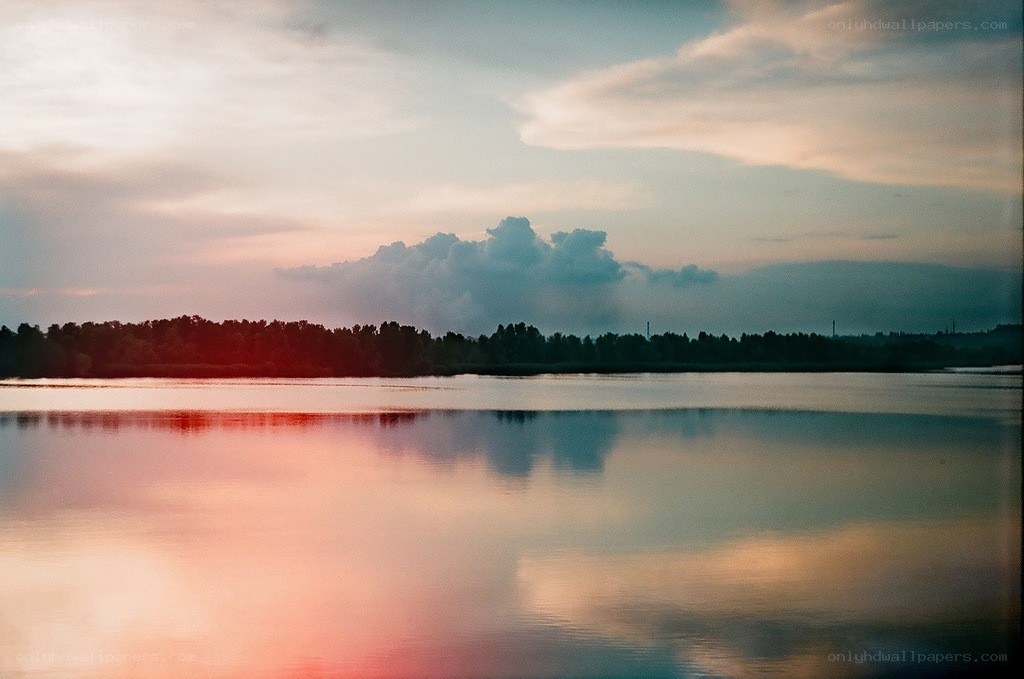 sunset over a calm lake