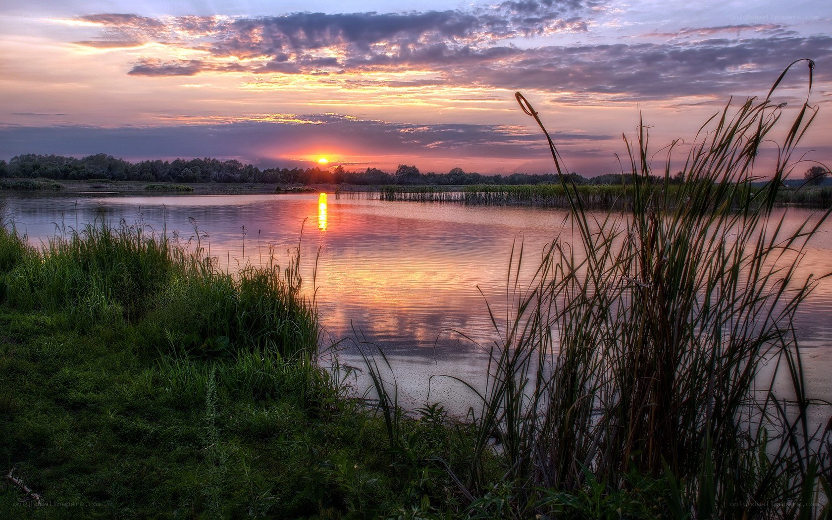 Sunset over a calm lake
