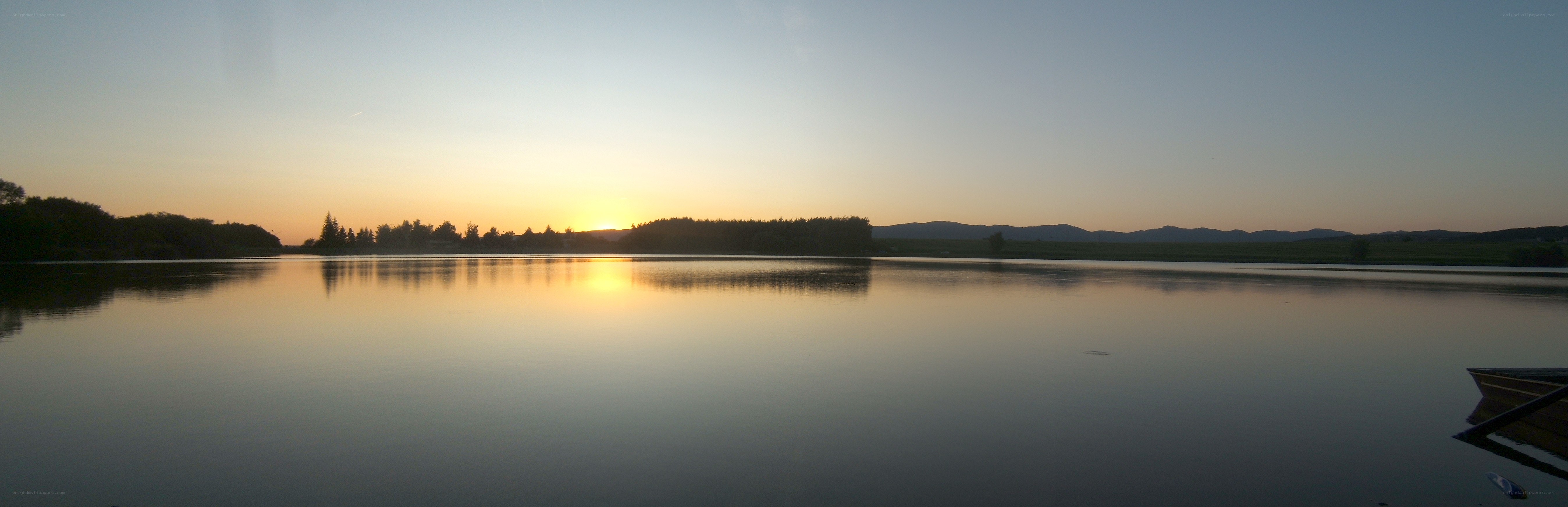 Sunset over a calm lake