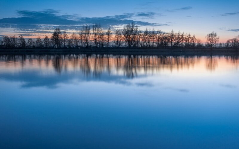 Sunset over a calm lake