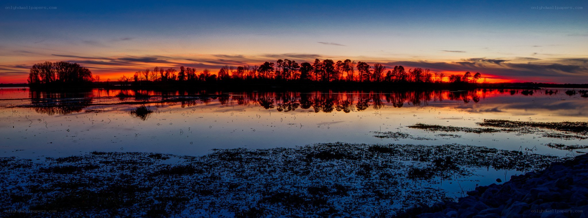 sunset over a calm lake