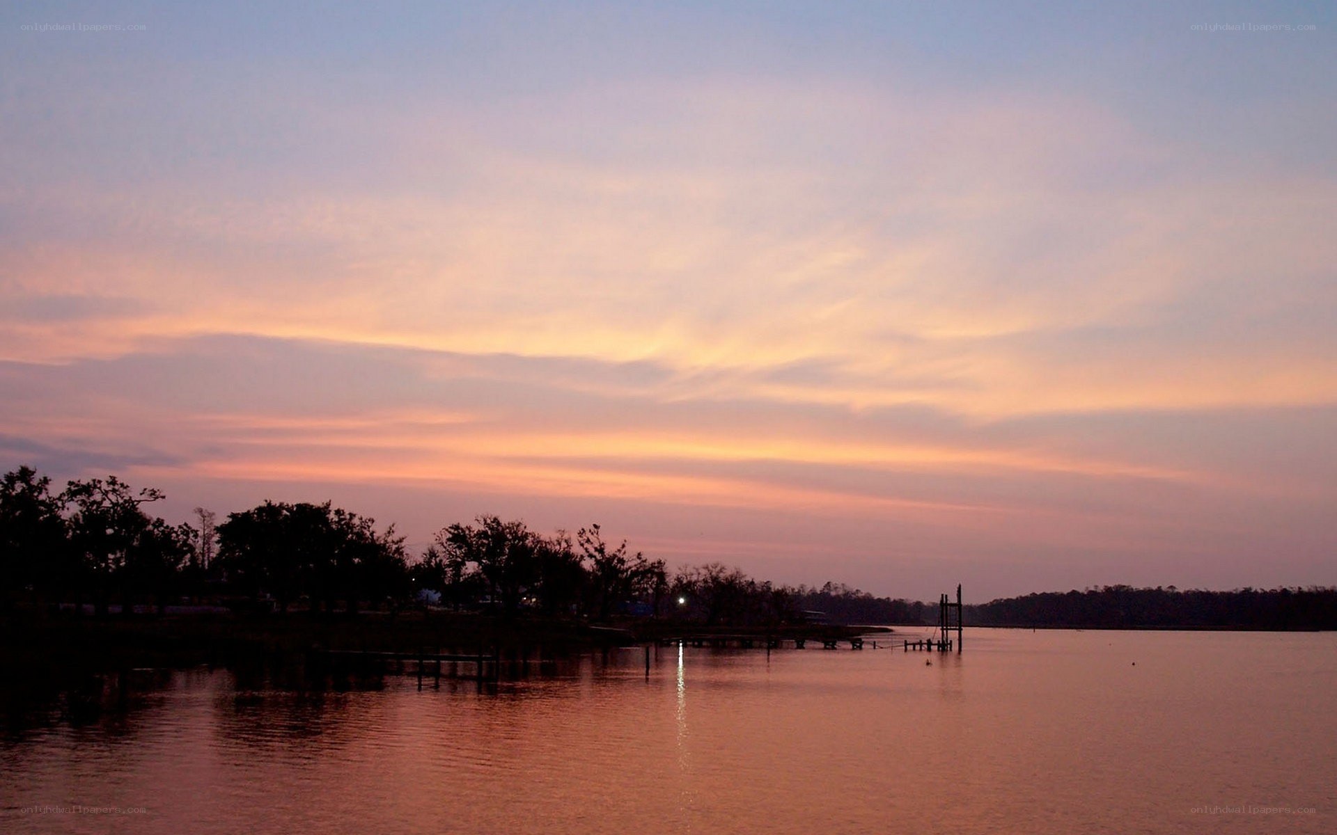 sunset over a calm lake