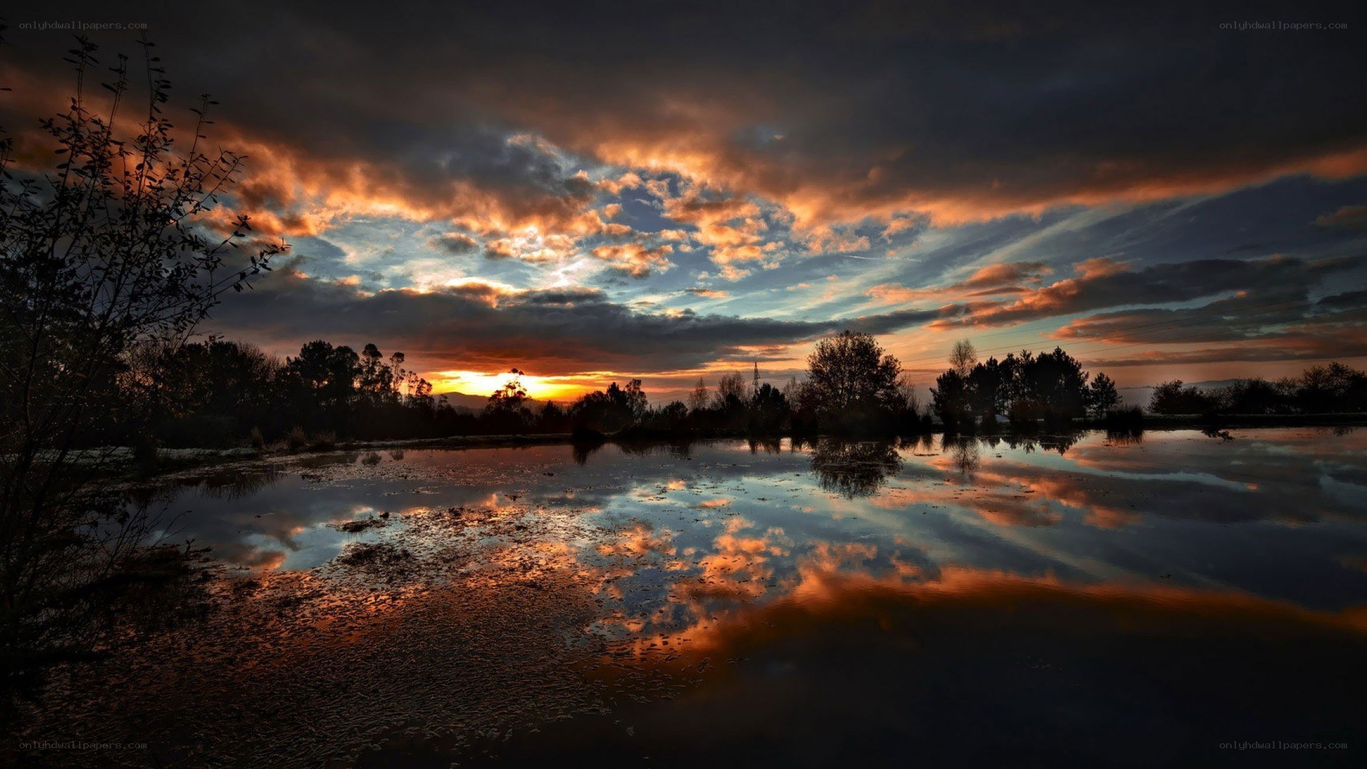 sunset over a calm lake
