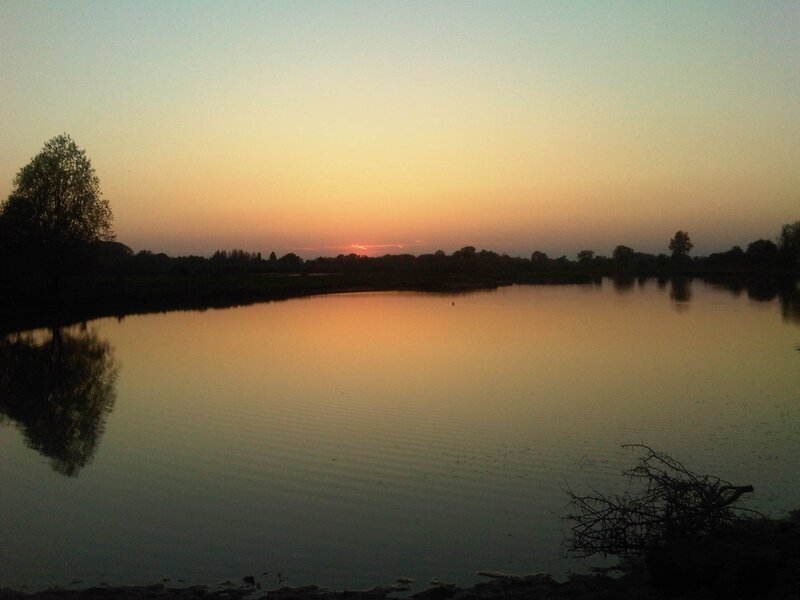 Sunset over a calm lake