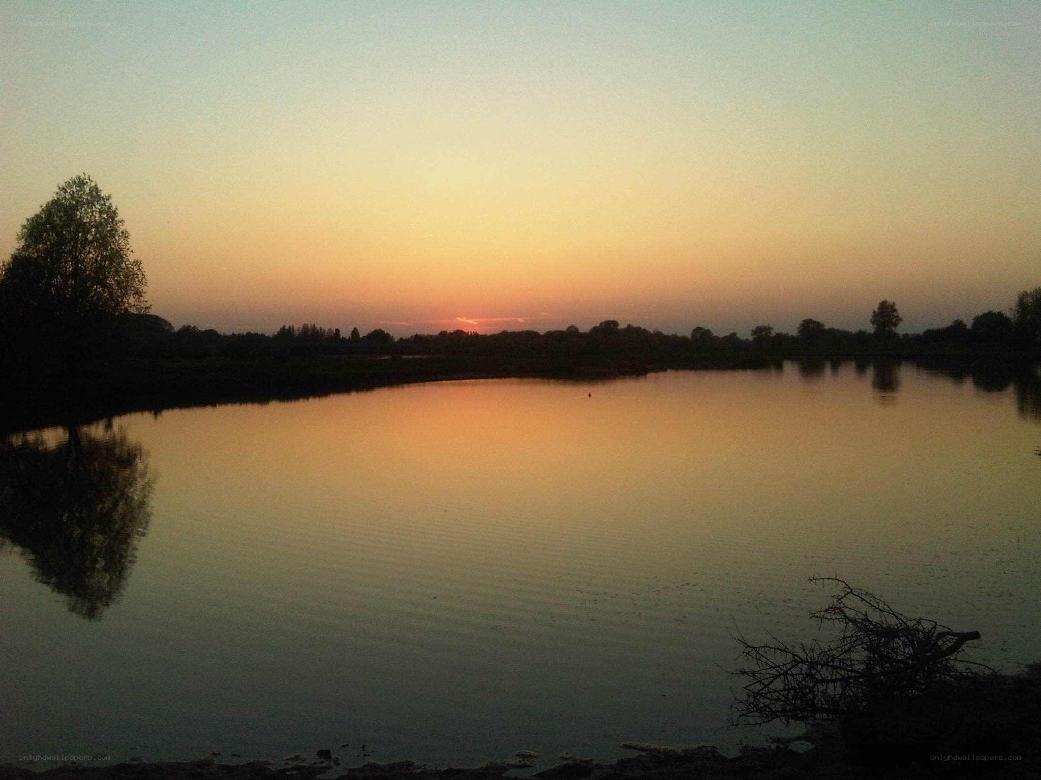 Sunset over a calm lake