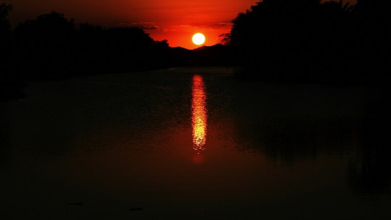 Sunset over a calm lake