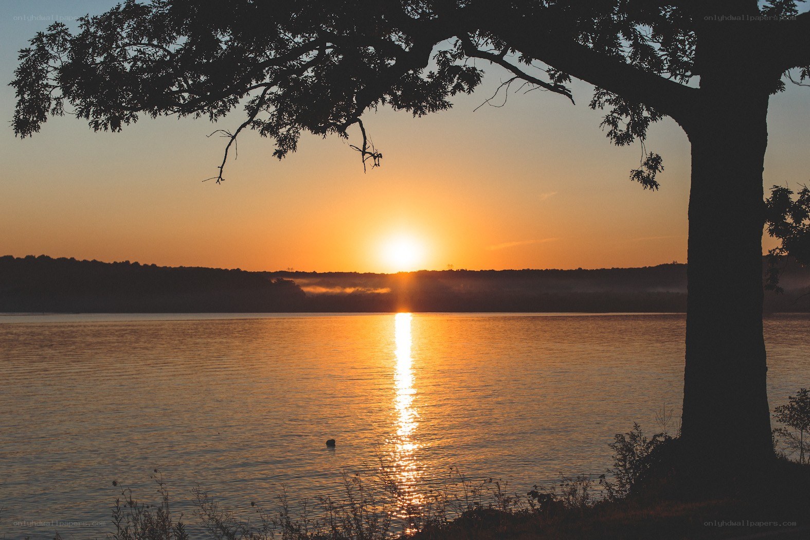 Sunset over a calm lake