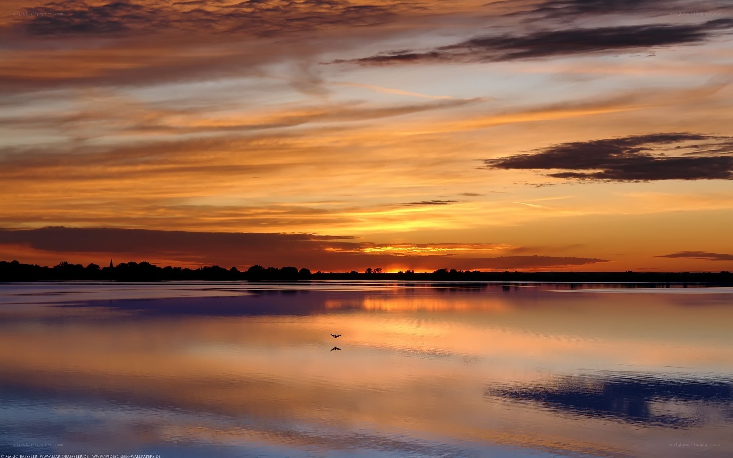 Sunset over a calm lake