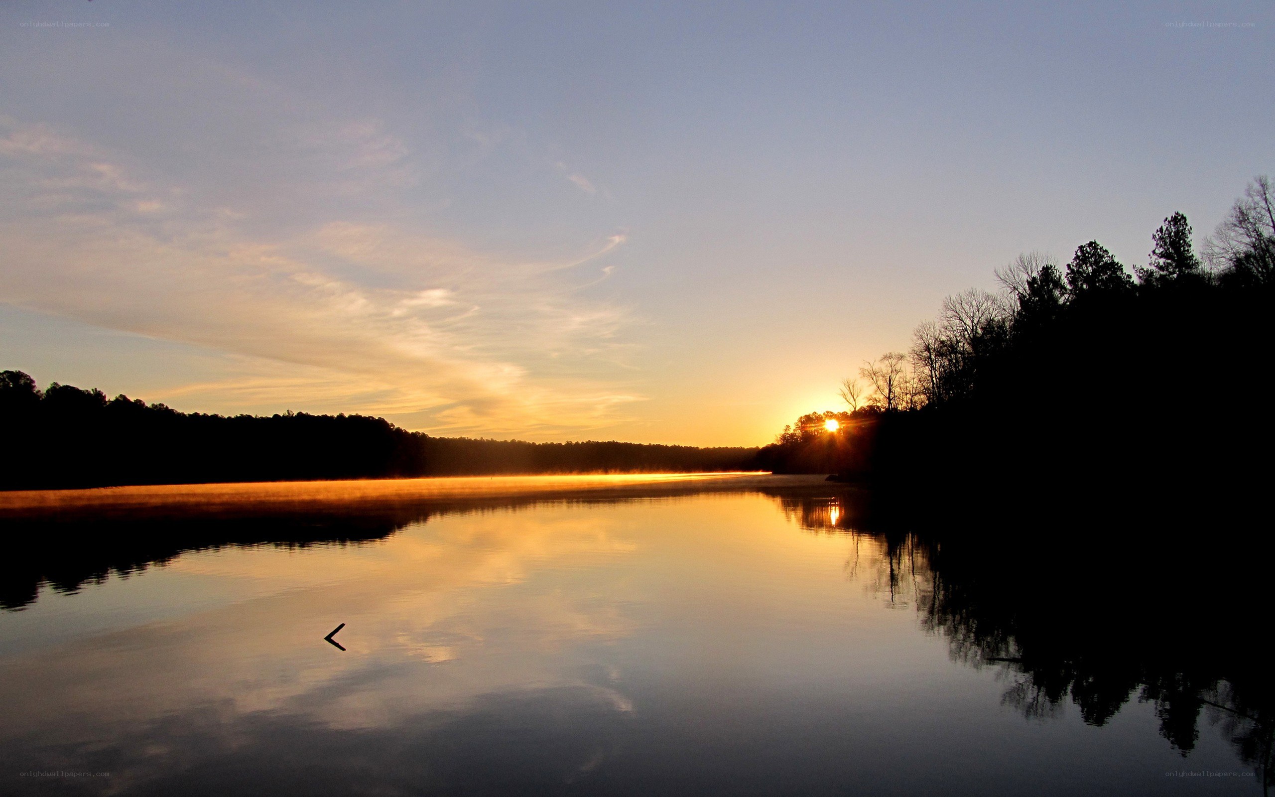 Sunset over a calm lake