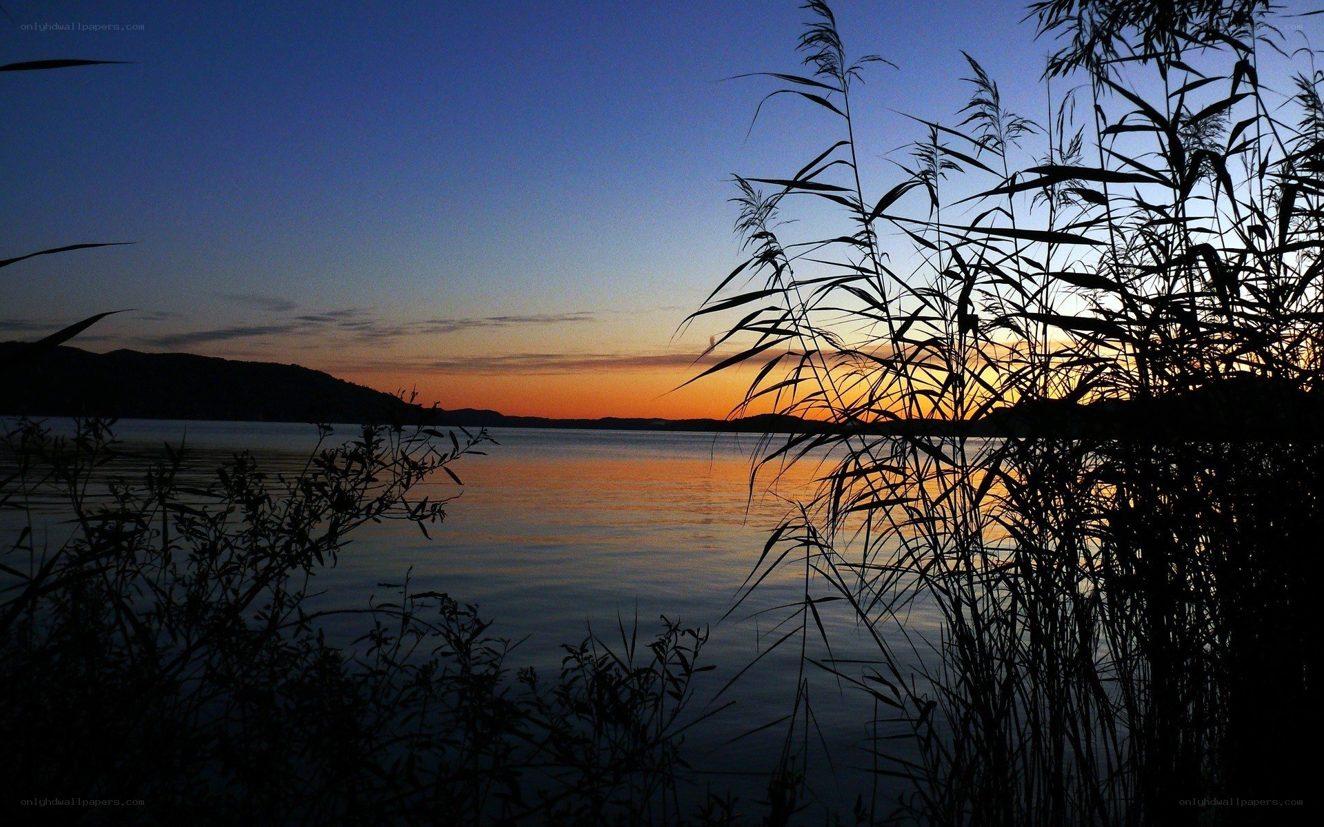 Sunset over a calm lake