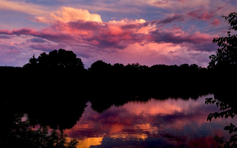 sunset over a calm lake