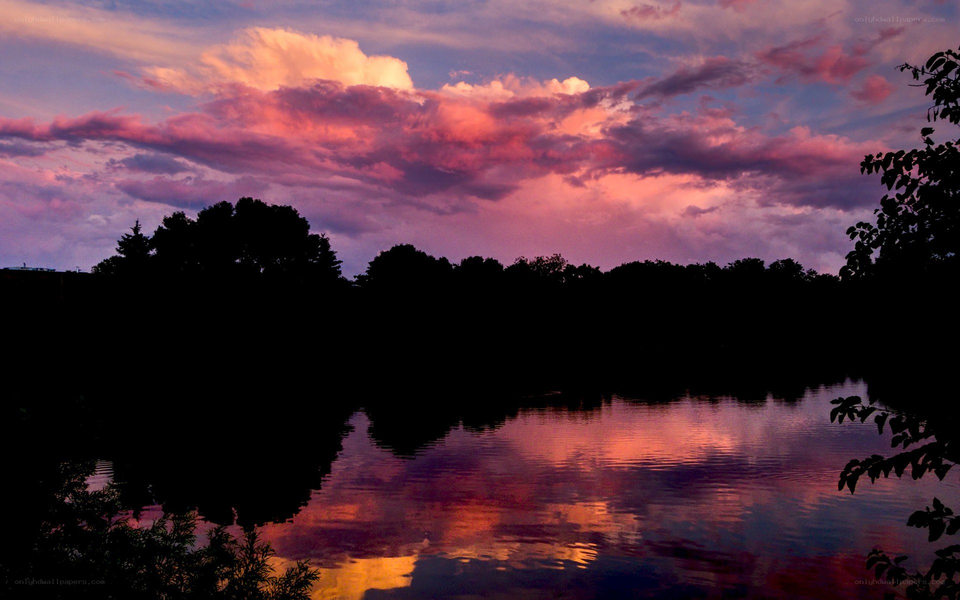 sunset over a calm lake