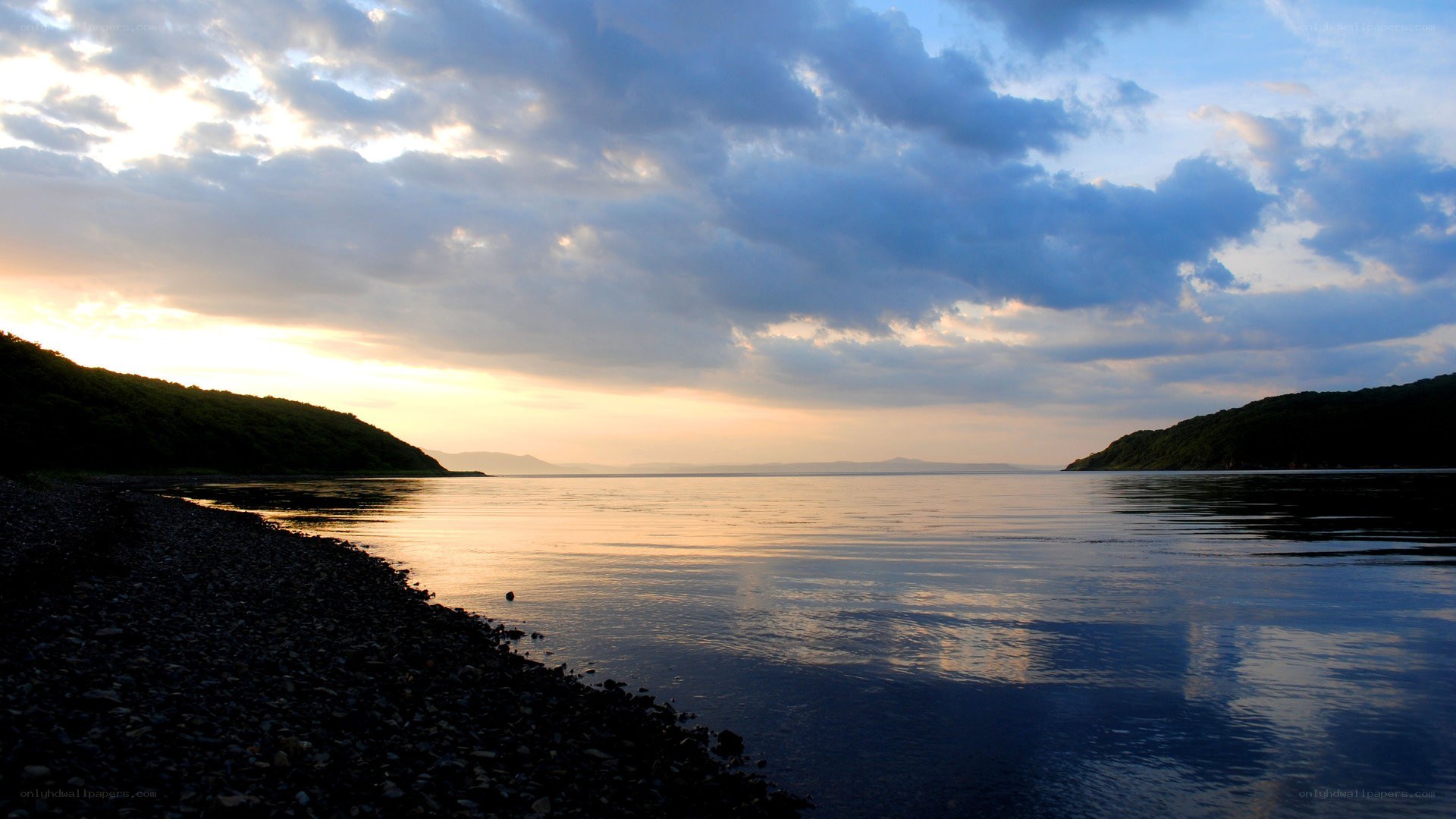 sunset over a calm lake