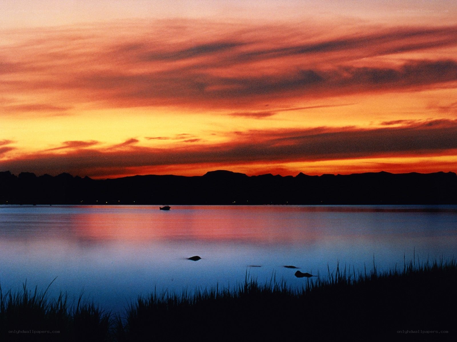 Sunset over a calm lake