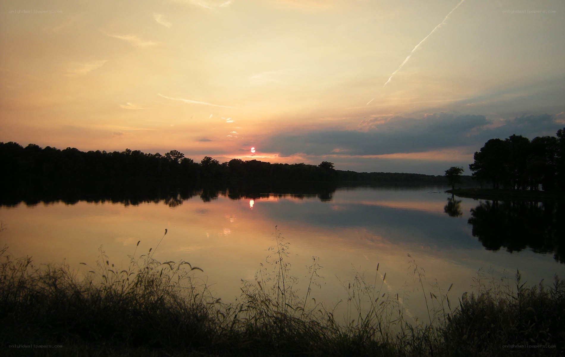 sunset over a calm lake