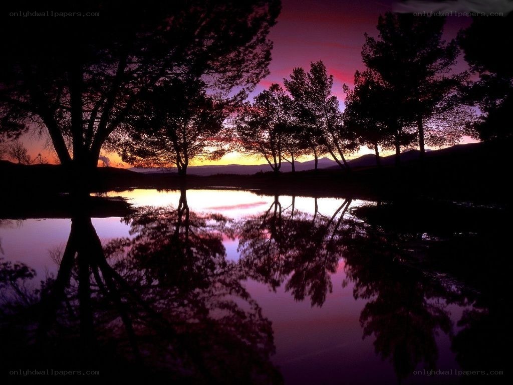 sunset over a calm lake