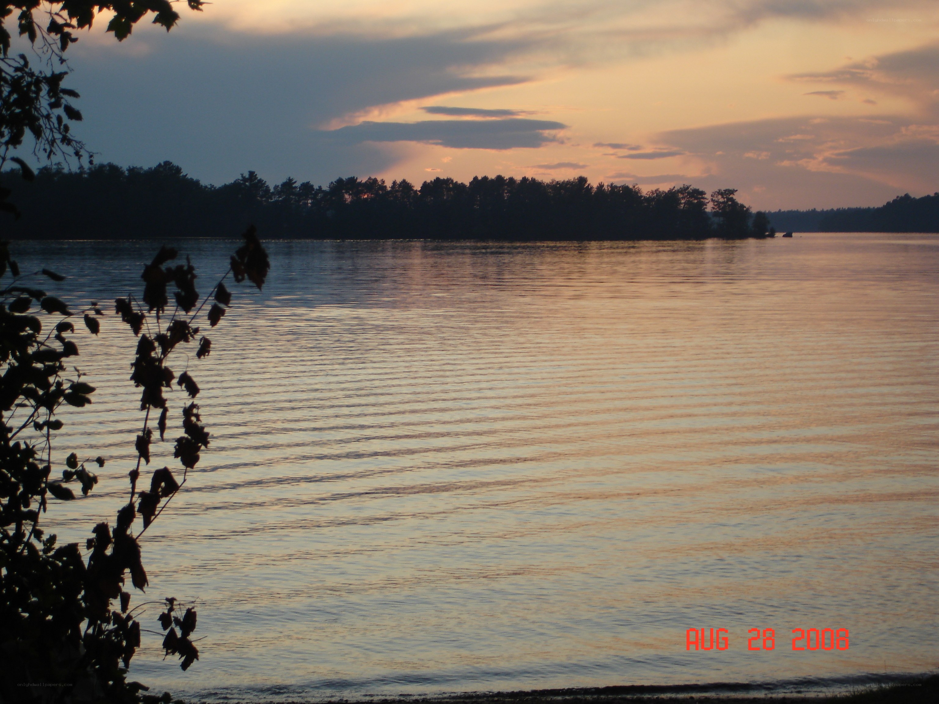sunset over a calm lake
