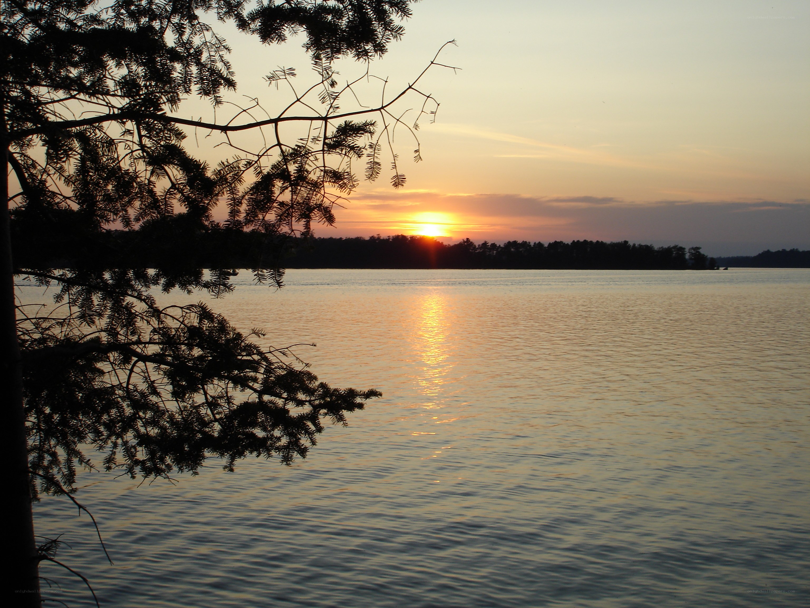 sunset over a calm lake