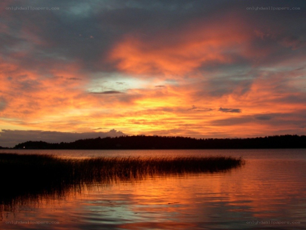 Sunset over a calm lake