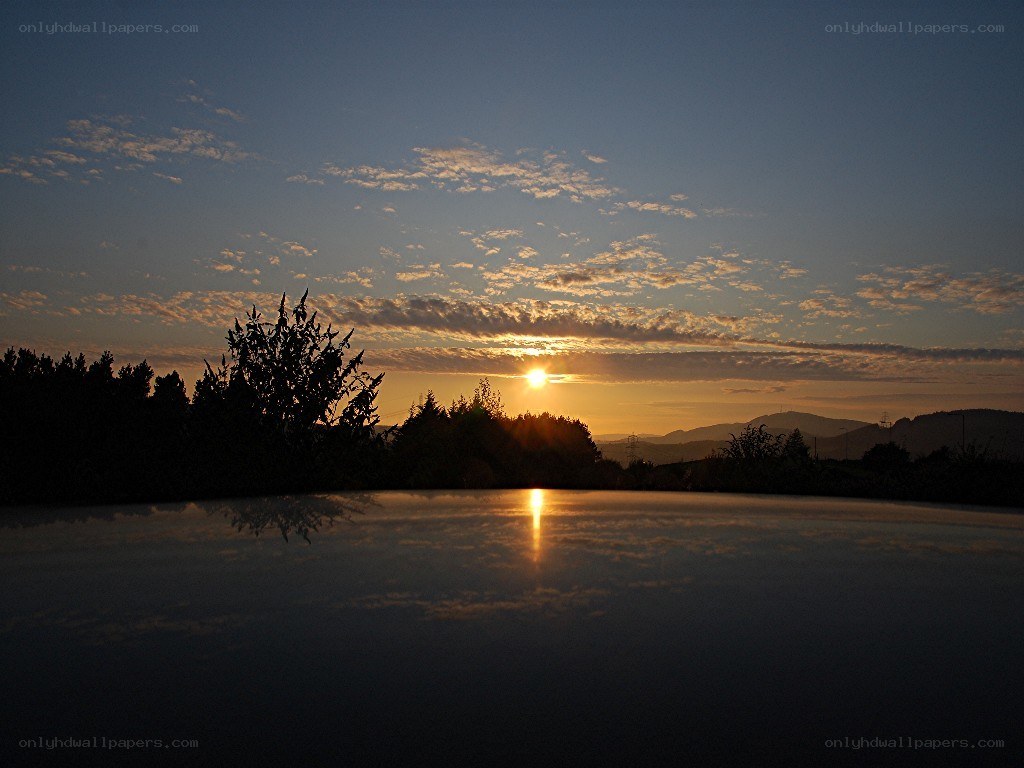 Sunset over a calm lake