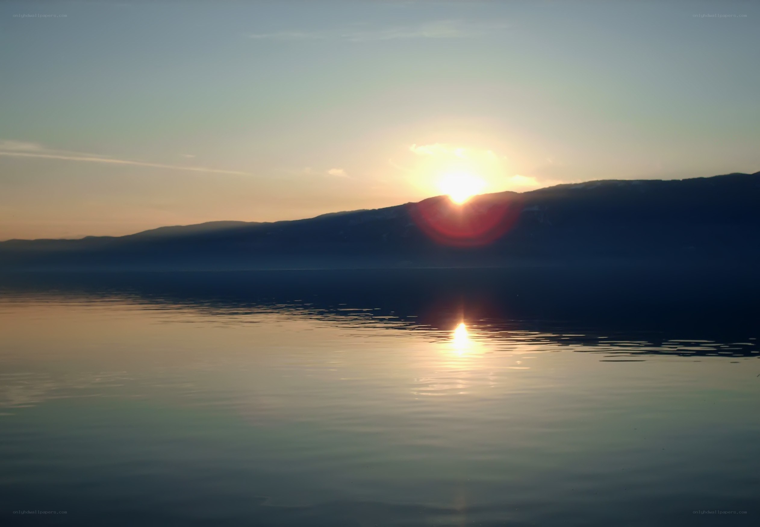 Sunset over a calm lake