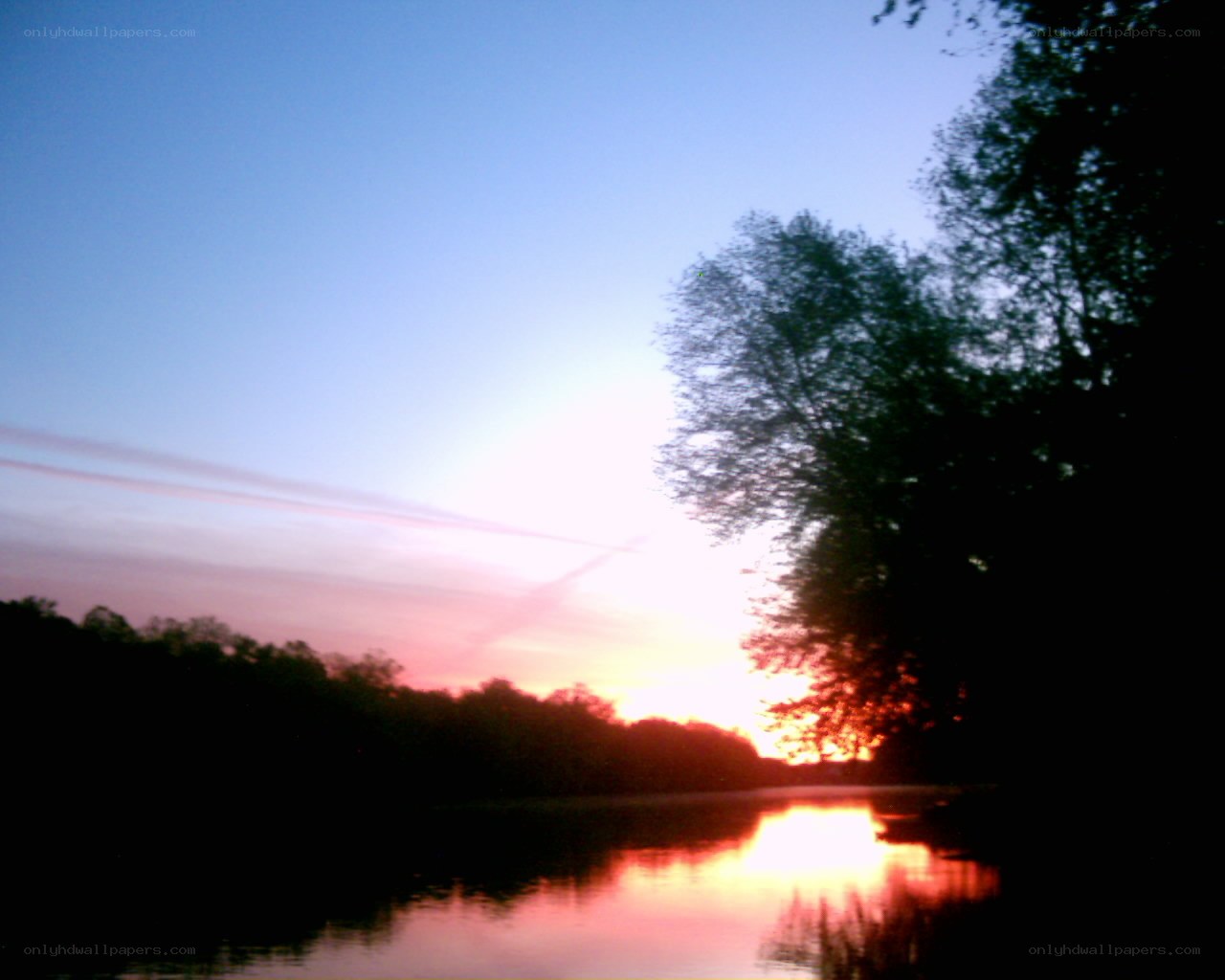 sunset over a calm lake