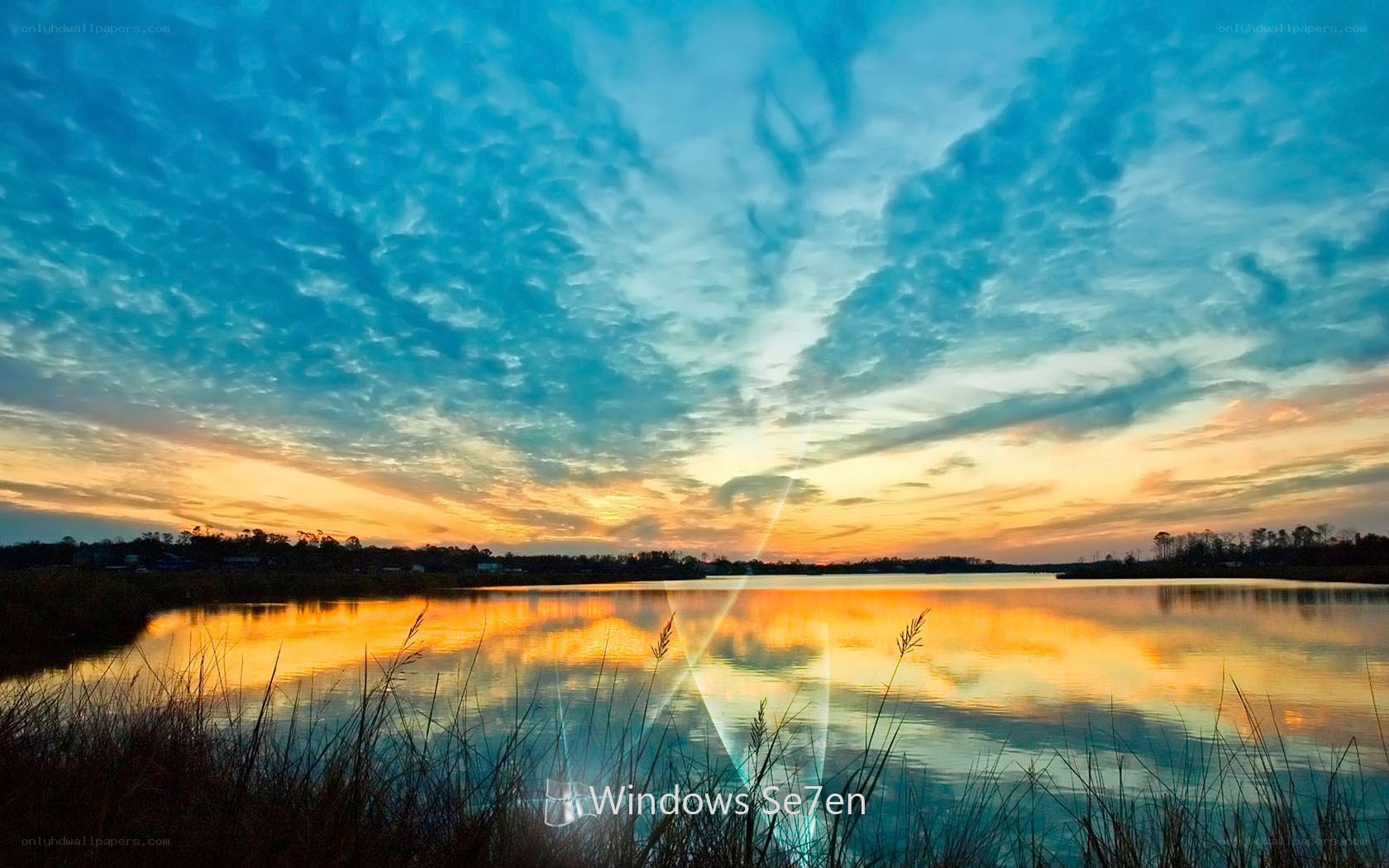sunset over a calm lake