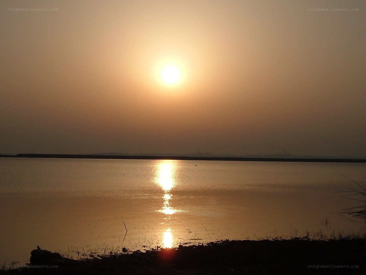 Sunset over a calm lake