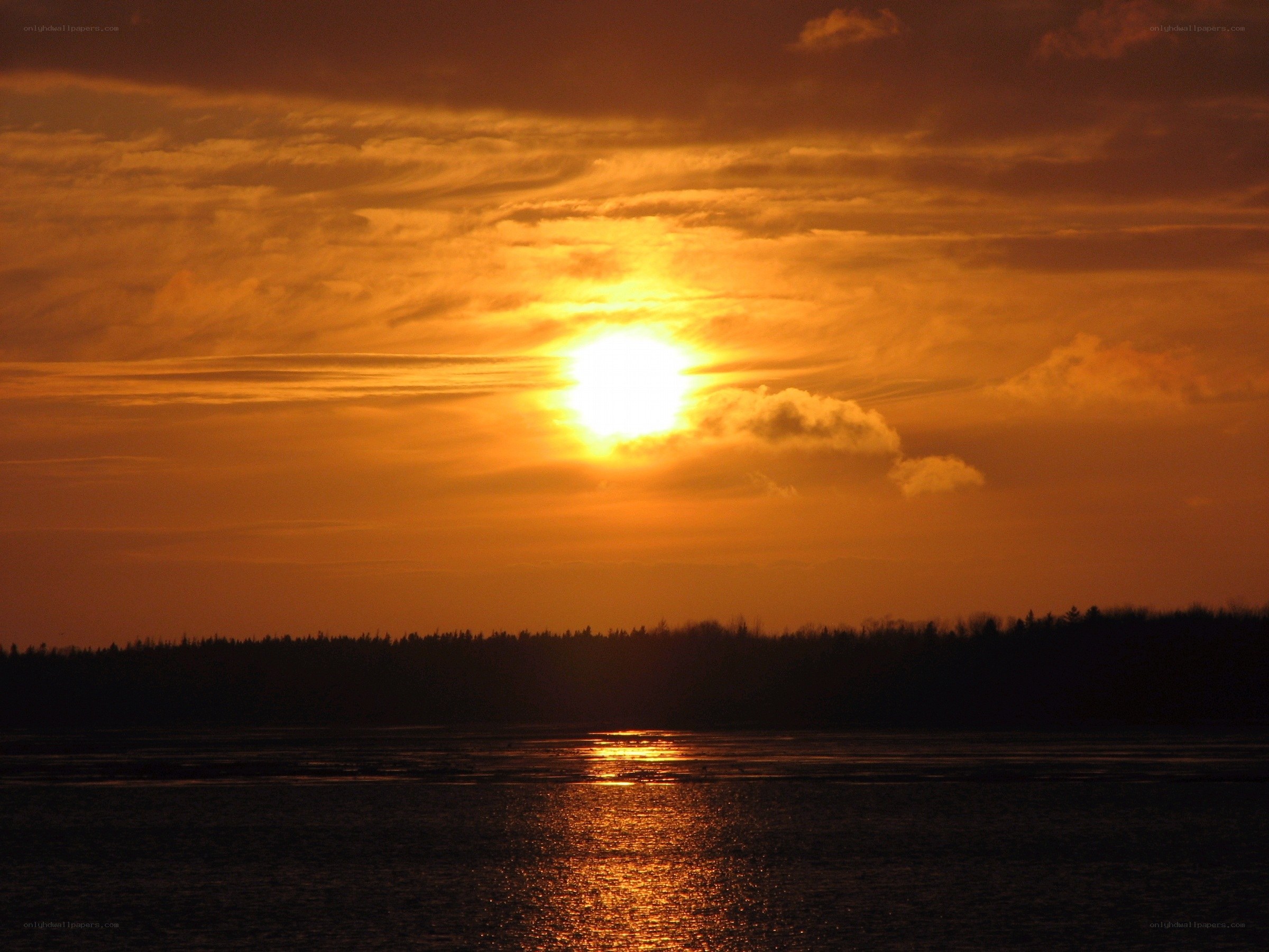 Sunset over a calm lake