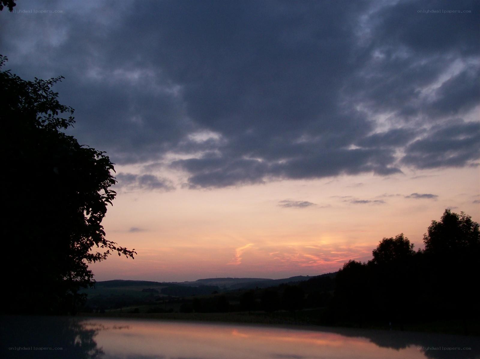 Sunset over a calm lake
