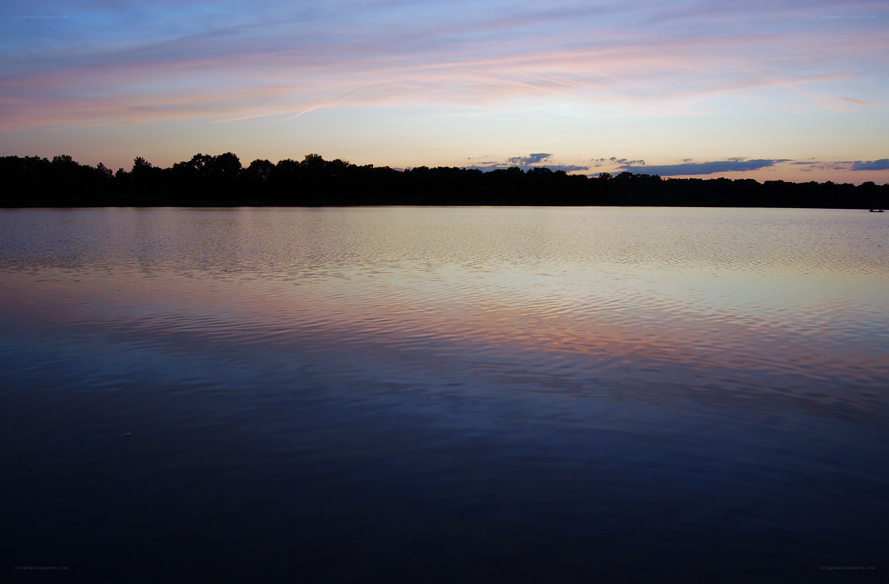 sunset over a calm lake