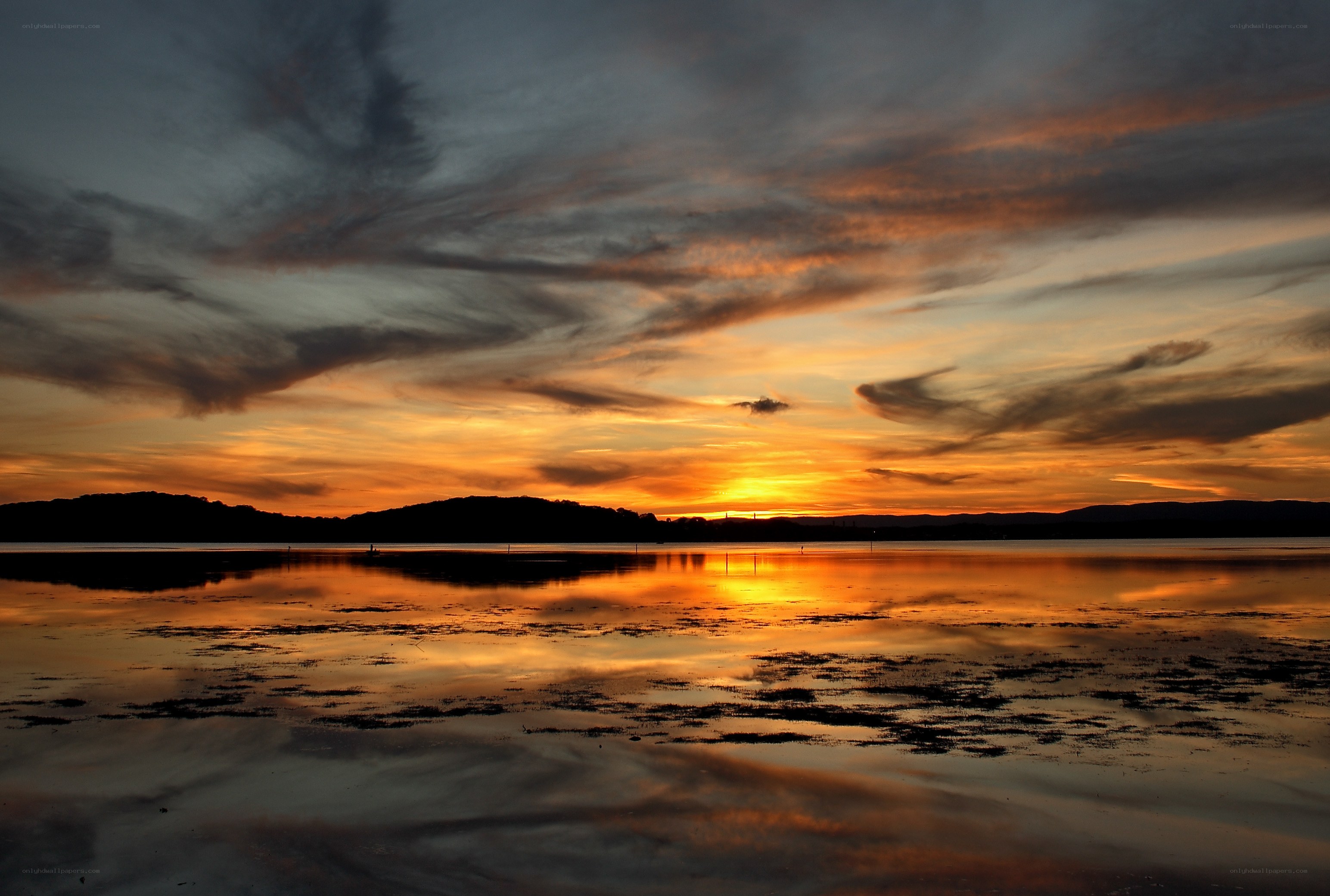 Sunset over a calm lake