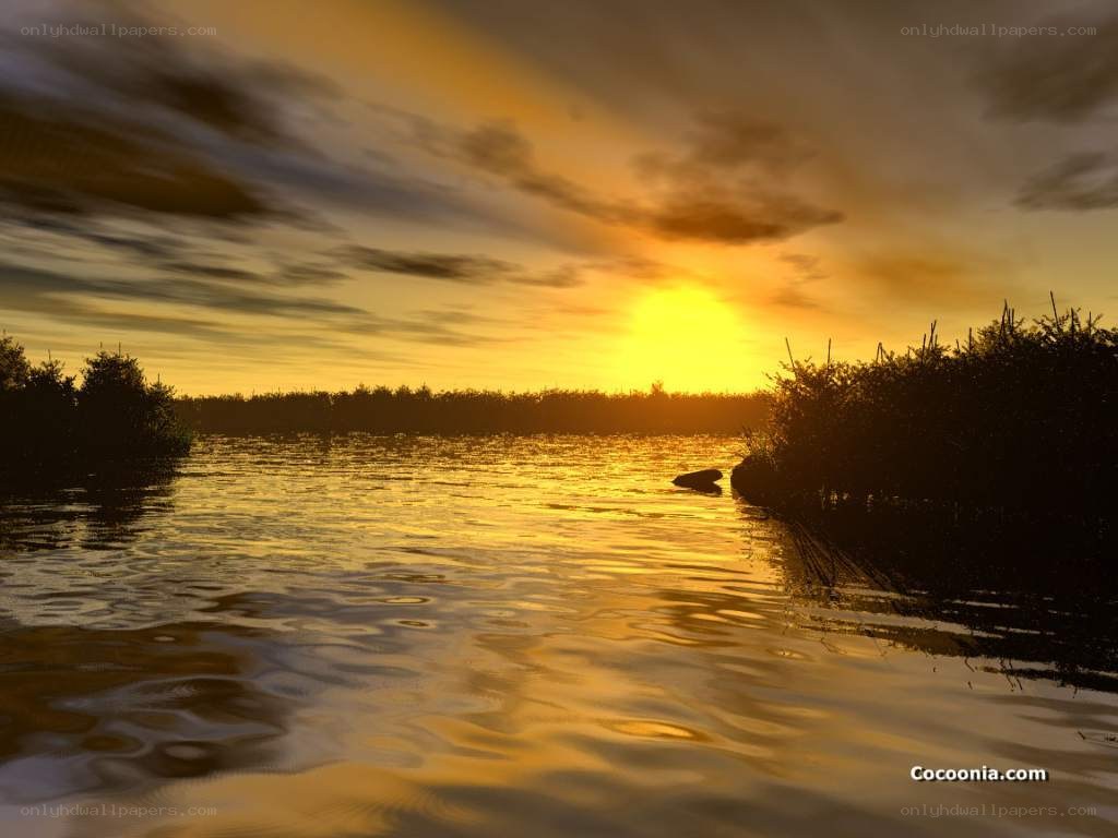 sunset over a calm lake
