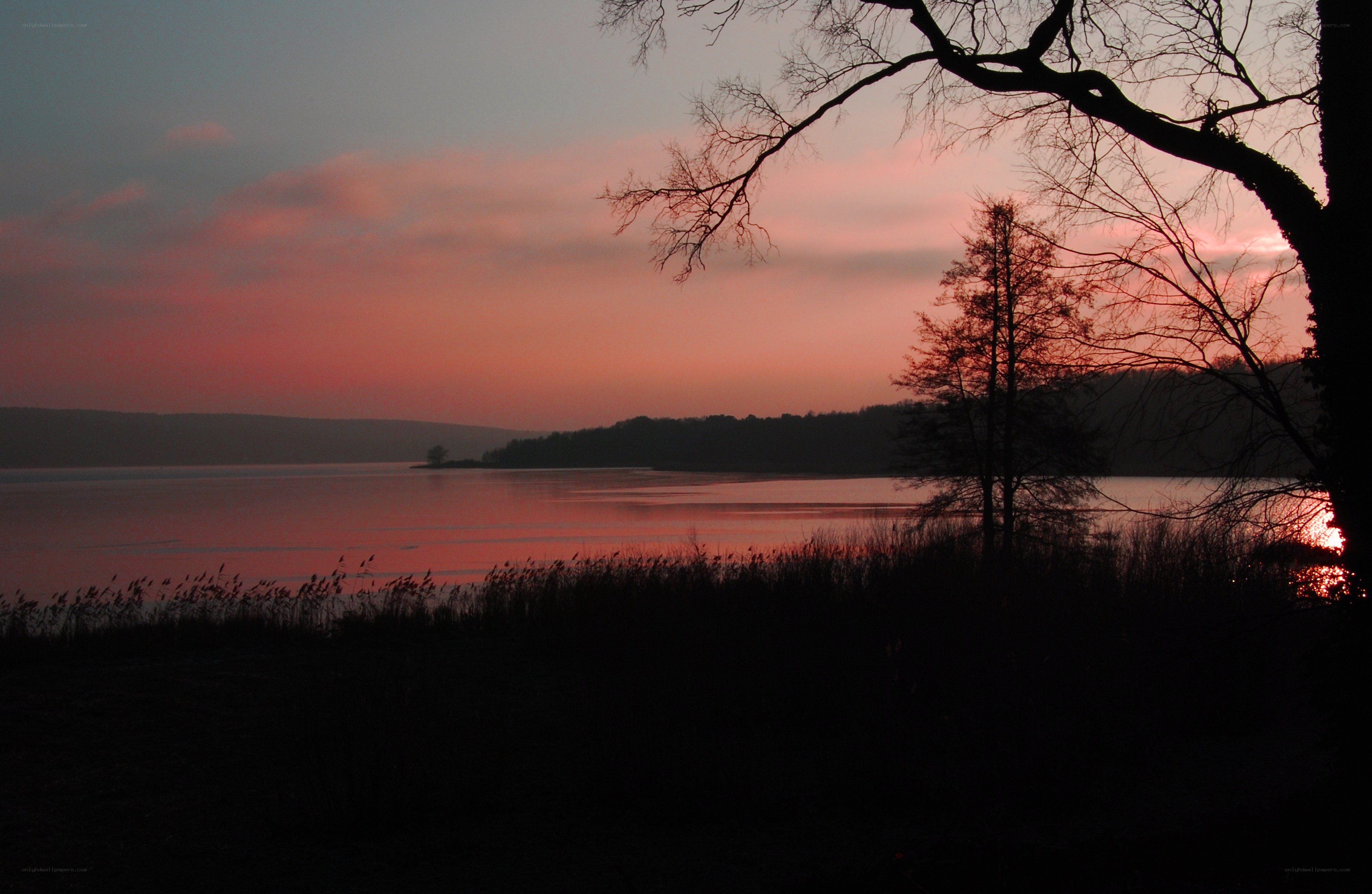 sunset over a calm lake
