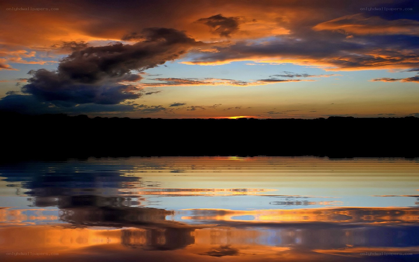 Sunset over a calm lake