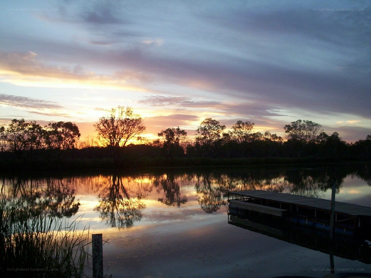 sunset over a calm lake