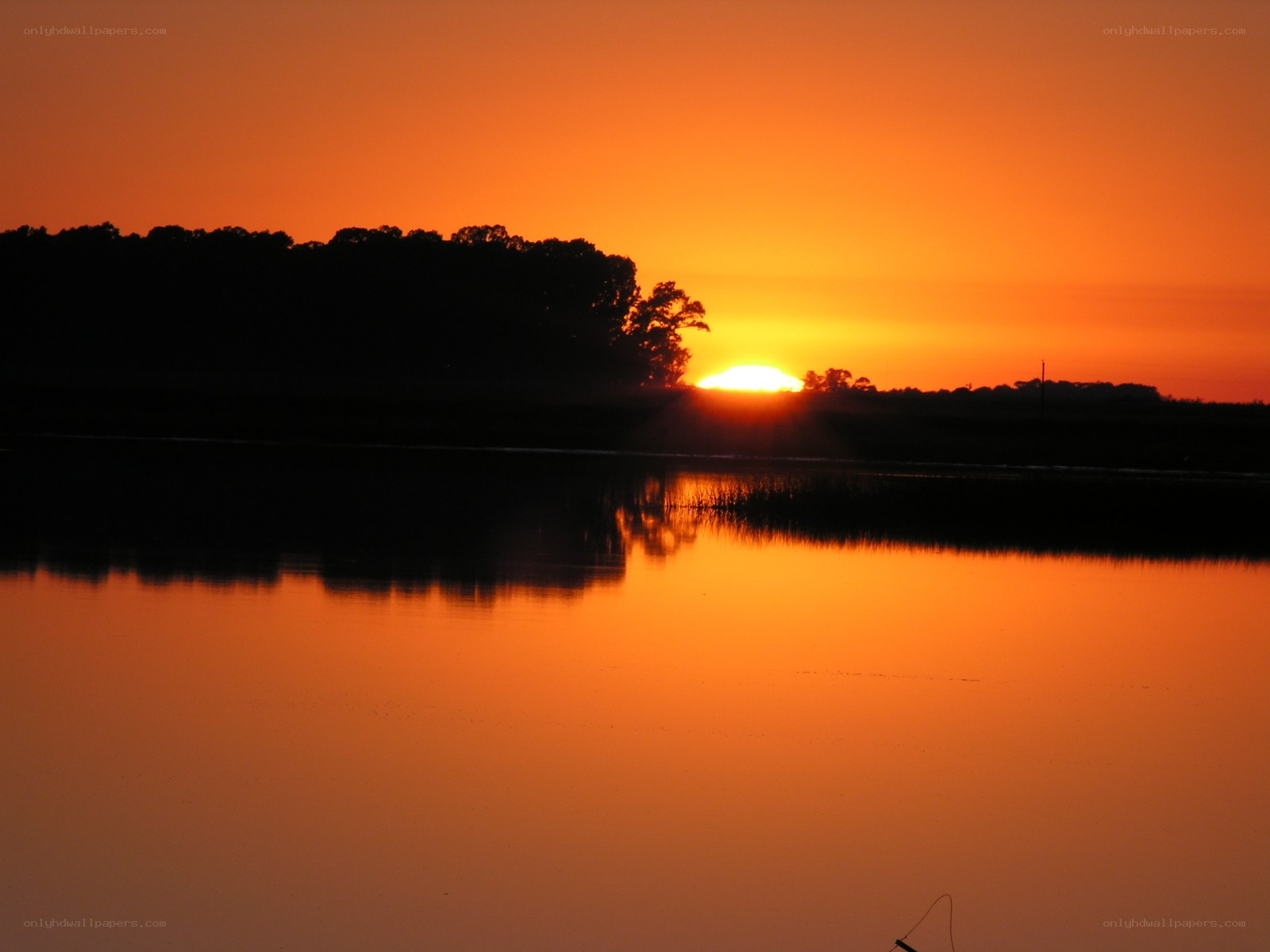 Sunset over a calm lake