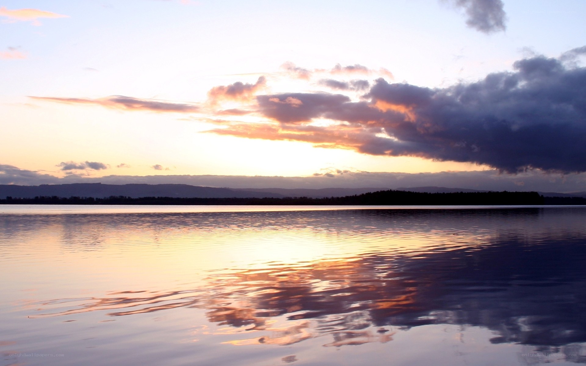 sunset over a calm lake