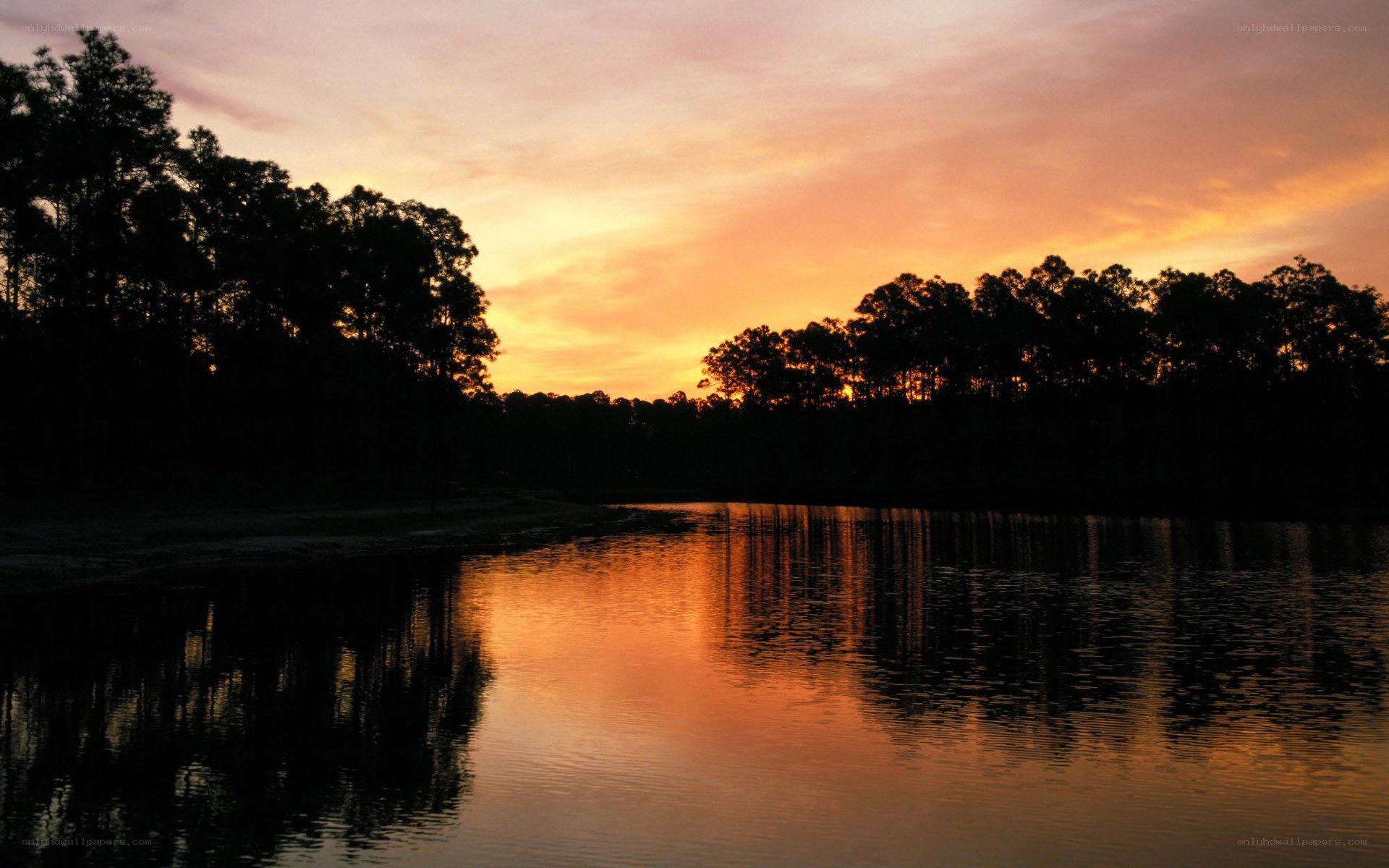 sunset over a calm lake