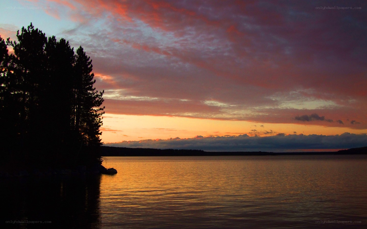 sunset over a calm lake