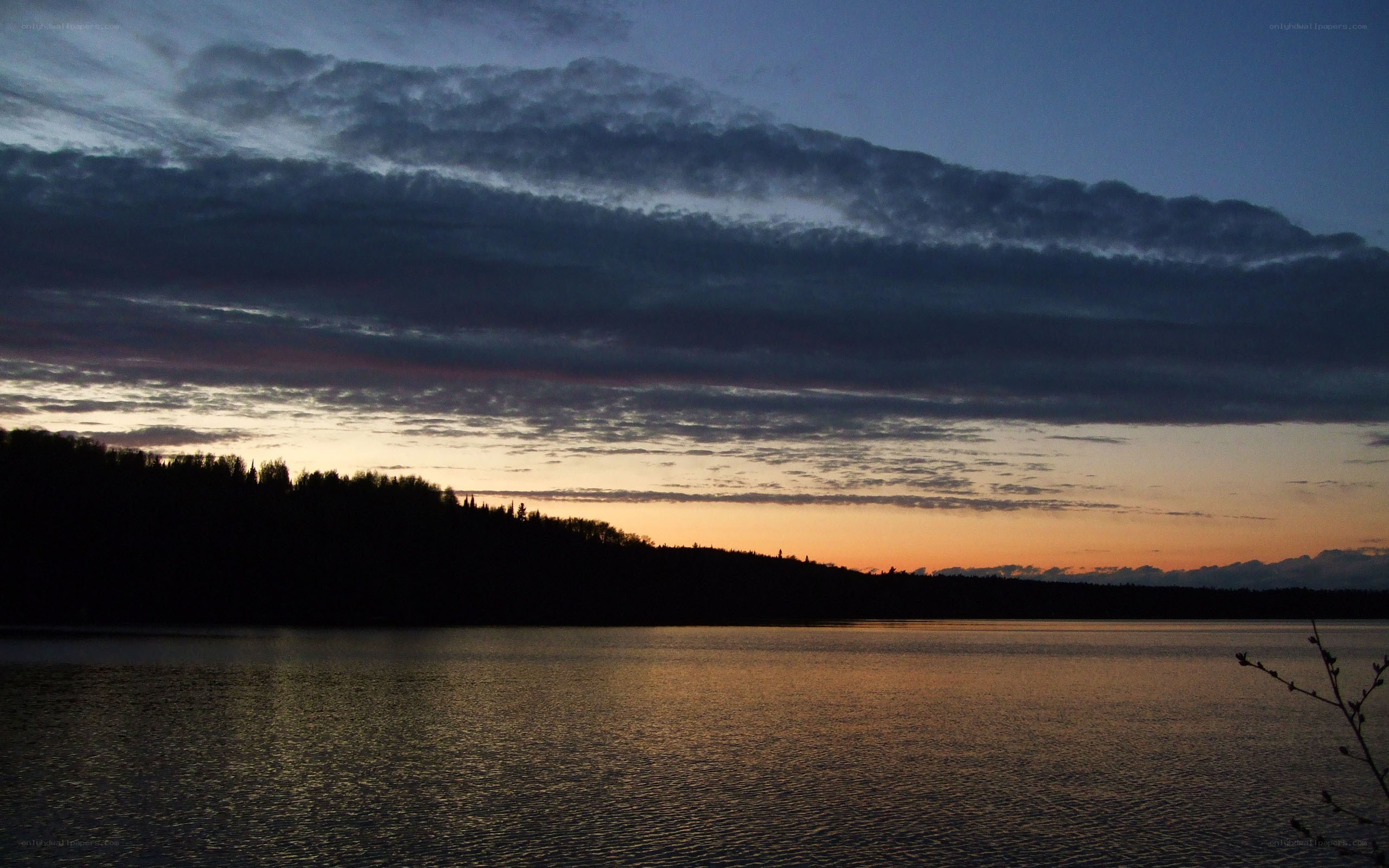 sunset over a calm lake