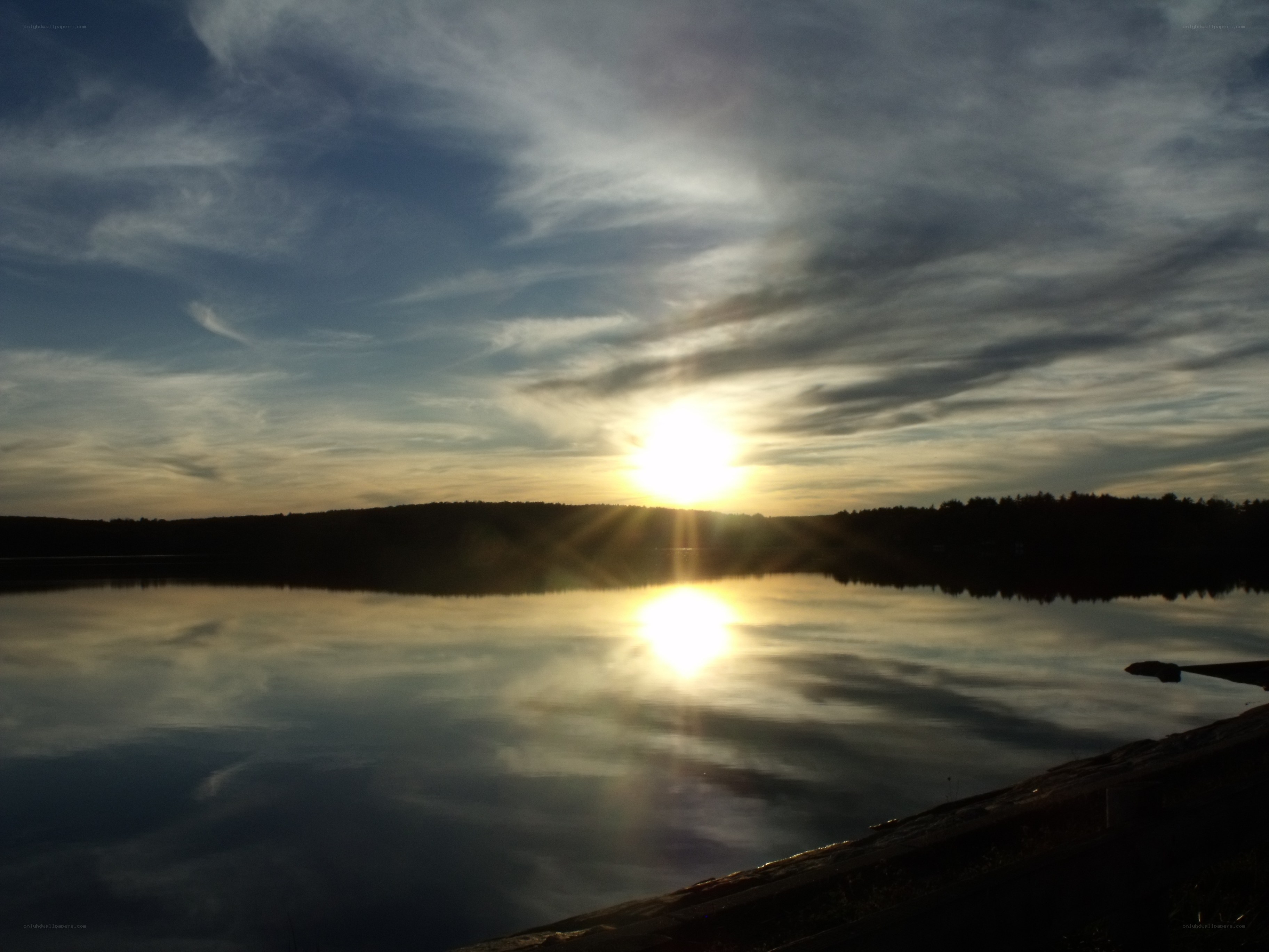 Sunset over a calm lake