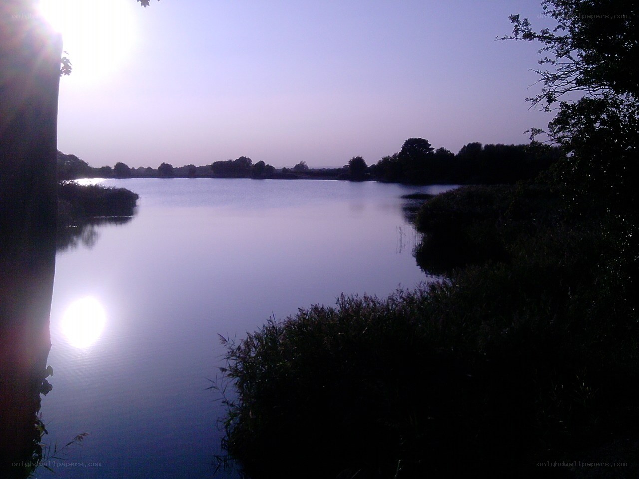 Sunset over a calm lake