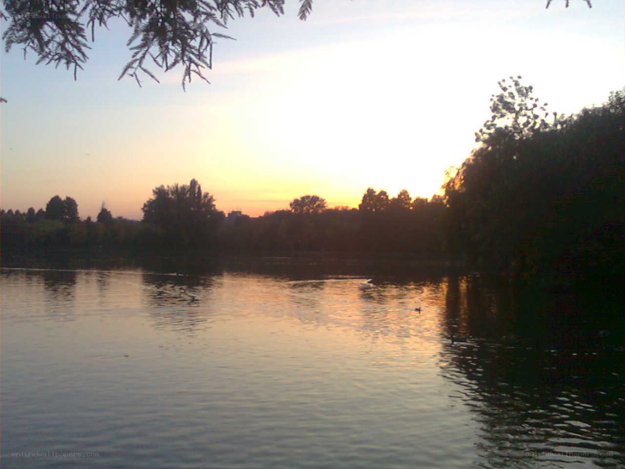 sunset over a calm lake
