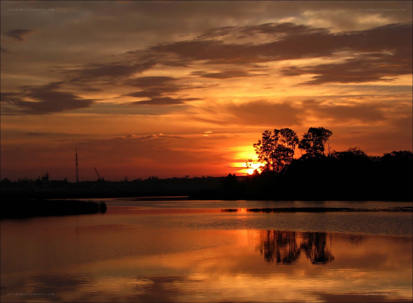 sunset over a calm lake