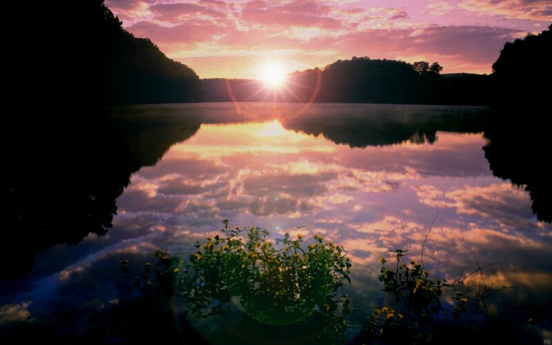 Sunset over a calm lake