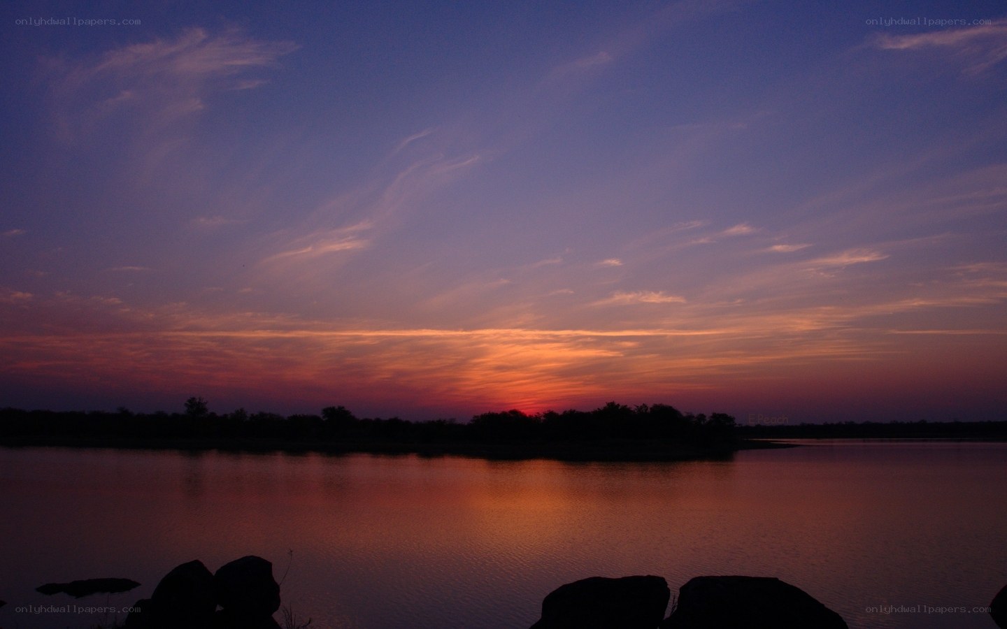 sunset over a calm lake