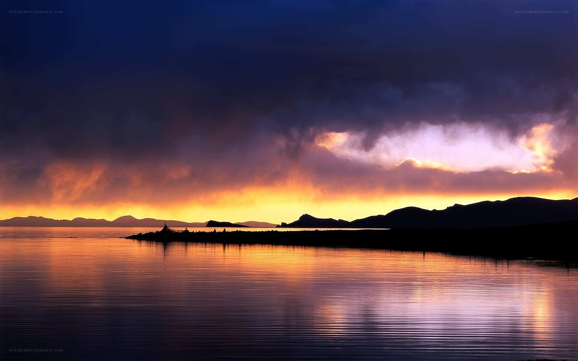 sunset over a calm lake