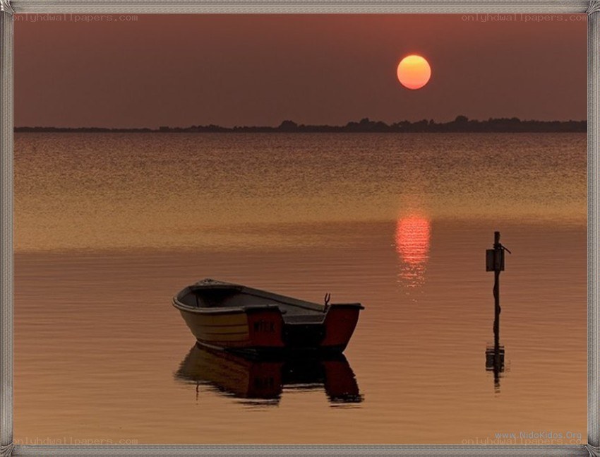Sunset over a calm lake