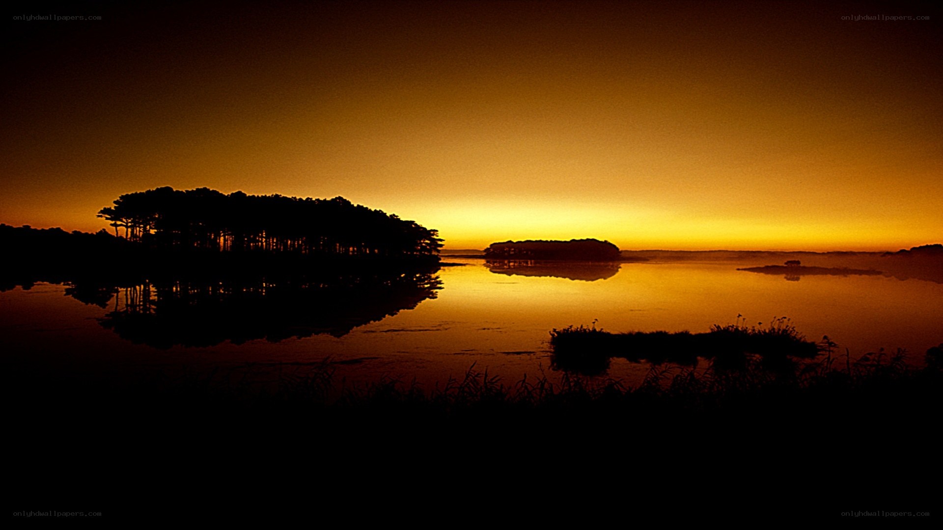 sunset over a calm lake